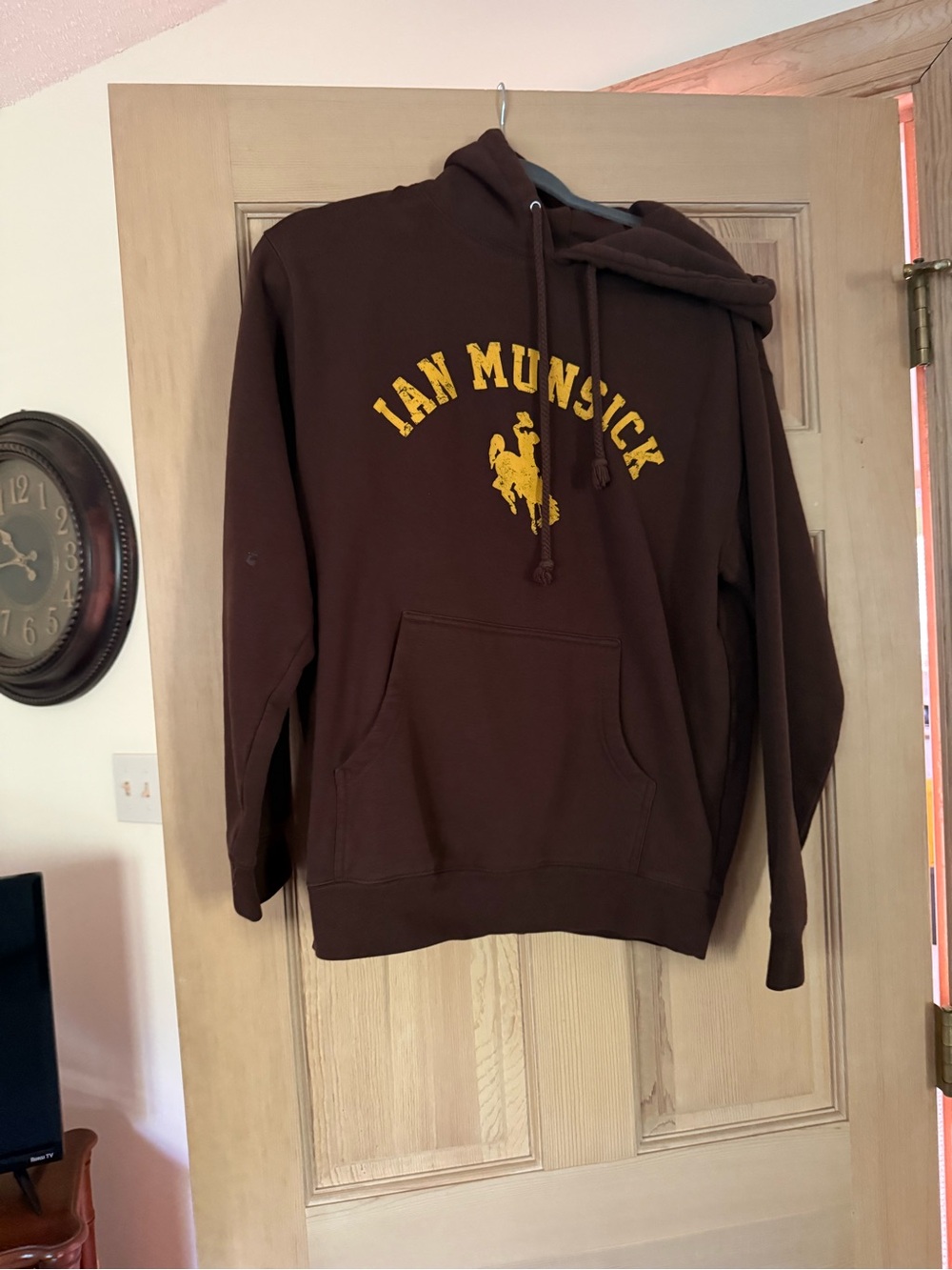 Ian Munsick Men's Brown Pullover Hoodie with Yellow Logo
